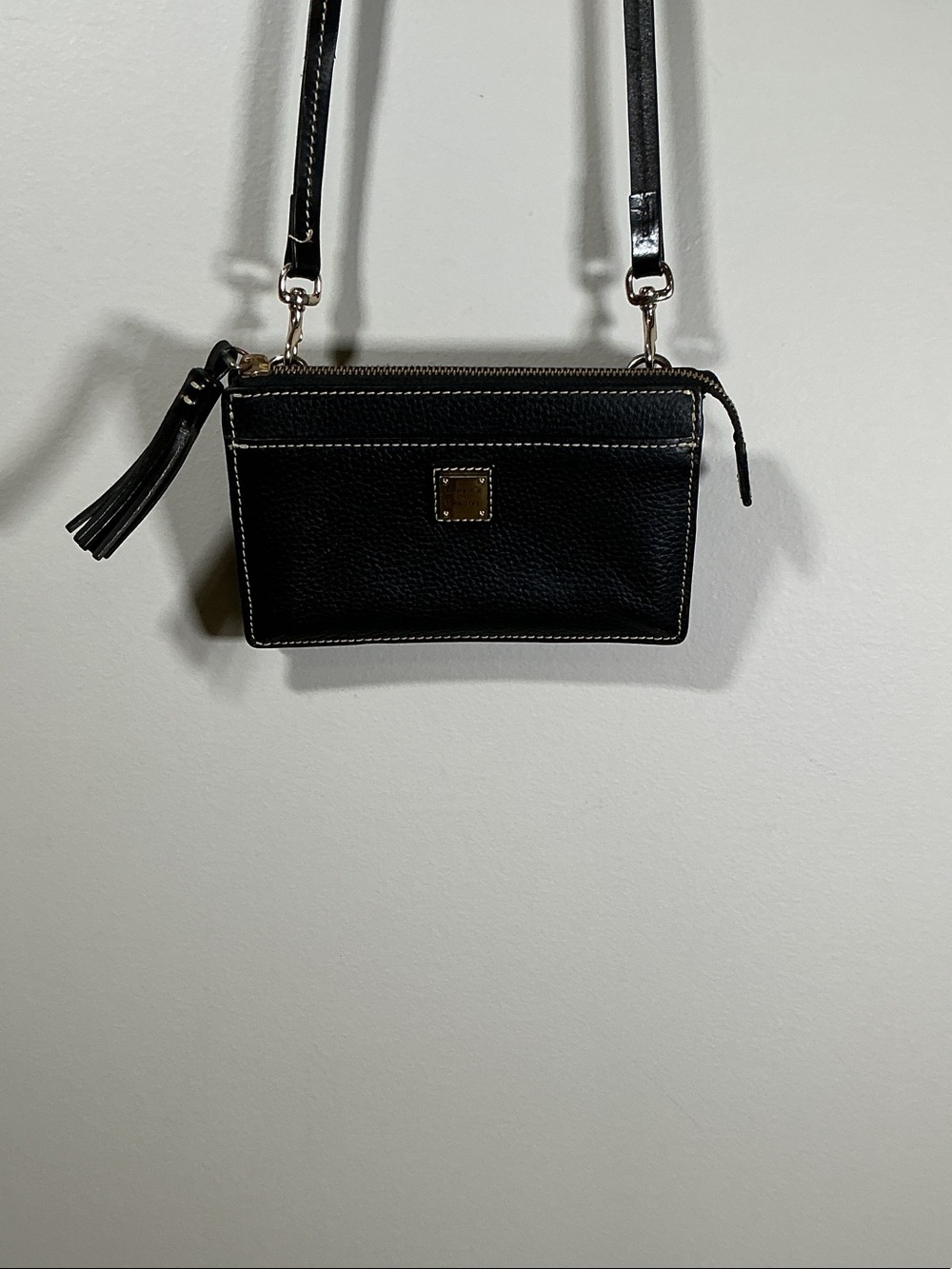Dooney & Bourke Black Leather Crossbody with Tassel Accent